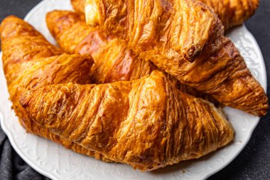 fresh croissant hot pastries French cuisine healthy meal food snack on the table copy space food background rustic top view
