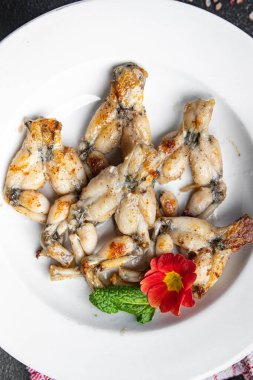 fried frog legs second course meat french food healthy meal food snack on the table copy space food background rustic top view