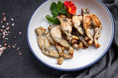 fried frog legs second course meat french food healthy meal food snack on the table copy space food background rustic top view