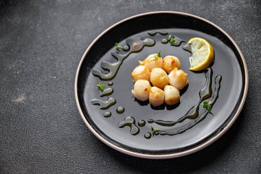 sea scallop fresh seafood fried meal food snack on the table copy space food background rustic top view