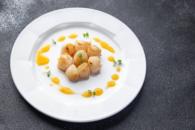 sea scallop fresh seafood fried meal food snack on the table copy space food background rustic top view