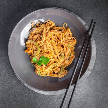 rice noodles vegetables, soy sauce, coconut cream, glass noodle meal food snack on the table copy space food background rustic top view