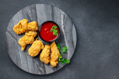 Tavuk nugget, kızarmış kümes hayvanları, fast food, abur cubur, fotokopi, uzay yiyecekleri arka plan kırsal manzarası.