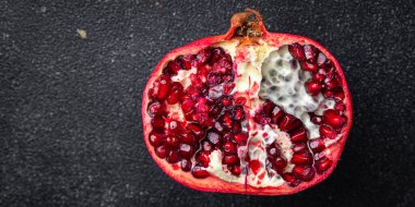 pomegranate fruit fresh red sweet berry meal food snack on the table copy space food background rustic top view keto or paleo diet veggie vegan or vegetarian food