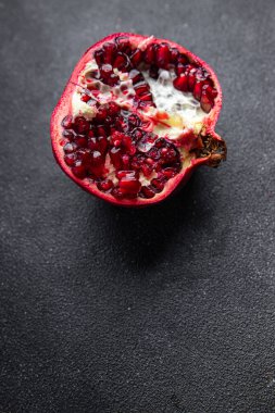 pomegranate fruit fresh red sweet berry meal food snack on the table copy space food background rustic top view keto or paleo diet veggie vegan or vegetarian food