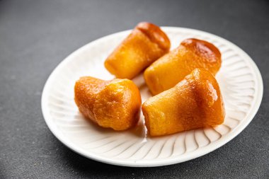 baba rum alcohol sweet dessert cake meal food snack on the table copy space food background rustic top view