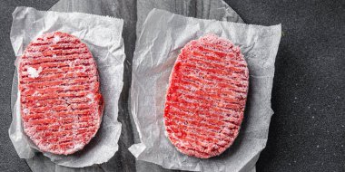meat cutlet frozen minced meat pork, beef, chicken semifinished meal food snack on the table copy space food background rustic top view