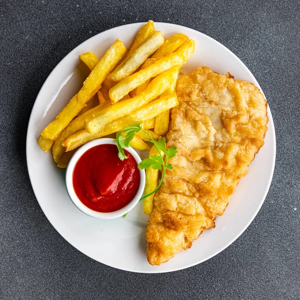 fish and chips french fries deep fried fast food takeaway healthy meal food snack on the table copy space food background rustic top view