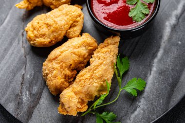 fast food chicken nuggets deep fried poultry meat meal food snack on the table copy space food background rustic top view