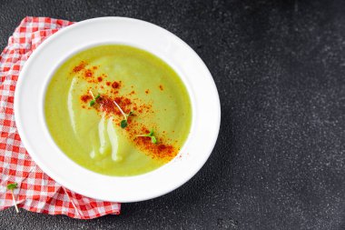 green broccoli cream soup vegetable dish healthy meal food snack on the table copy space food background rustic top view