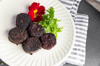 black pudding fresh bloody sausage meal food snack on the table copy space food background rustic top view clipart