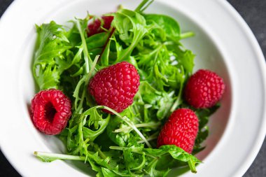 salad raspberry green leaves mix salad healthy meal food snack on the table copy space food background rustic top view