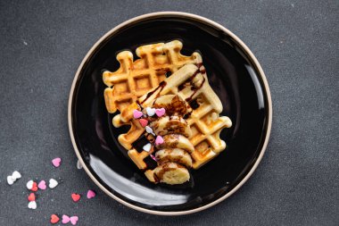 waffles Belgian or American dessert fast food sweet meal food snack on the table copy space food background rustic top view