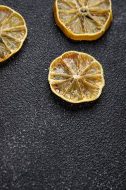 dried lemon slice meal food snack on the table copy space food background rustic top view