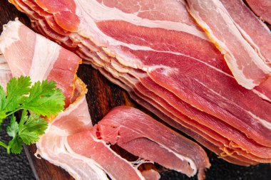 bacon strips slice smoked lard meat meal food snack on the table copy space food background rustic top view