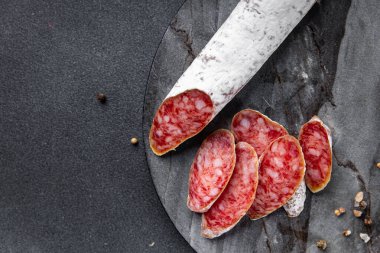 sausage Fuet cured meat  meal food snack on the table copy space food background rustic top view