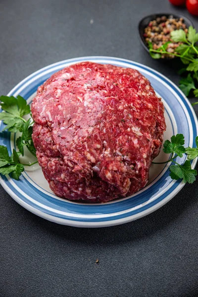 raw beef minced meat ground meat fresh ready to cook meal food snack on the table copy space food background rustic top view