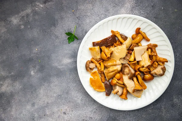 stock image mushroom salad mix appetizer white mushroom, boletus mushroom, chanterelle mushroom, ready to eat healthy meal food snack on the table copy space food background rustic top view