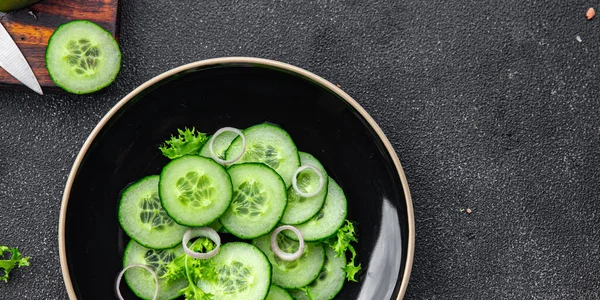 stock image cucumber salad fresh vegetable healthy meal food snack on the table copy space food background rustic top view keto or paleo diet veggie vegan or vegetarian food