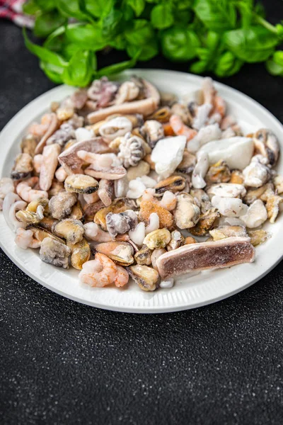 stock image seafood salad frozen food mussels, rapan, octopus, scallop, squid healthy meal food snack on the table copy space food background rustic top view 