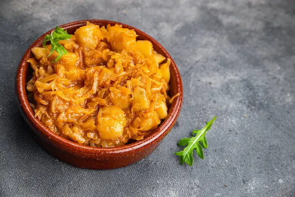 stock image stewed cabbage with vegetables healthy meal food snack on the table copy space food background rustic top view keto or paleo diet veggie vegan or vegetarian food no meat