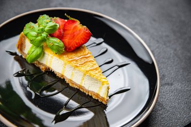 Cheesecake klasiği tatlı tatlı tatlı tatlı tatlı pasta doğal malzeme sağlıklı yemek atıştırmalıkları masanın üzerinde fotokopi uzayı arka plan kırsal üst görünüm