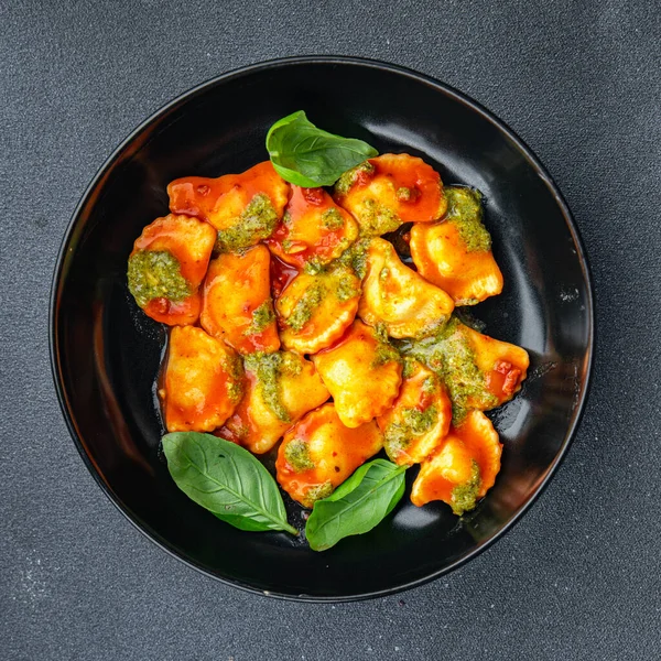 stock image pesto sauce ravioli , meat, tomato sauce meal food snack on the table copy space food background rustic top view