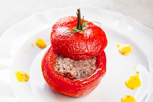 stuffed tomato meat filling tomatoes baked vegetable food healthy meal food snack on the table copy space food background rustic top view keto or paleo diet