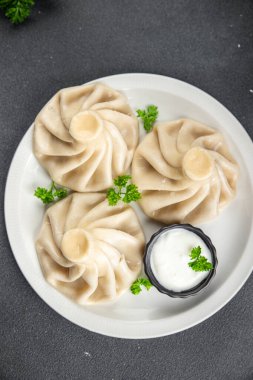 khinkali hamur köftesi doldurulmuş et yemeği abur cuburu masa üzerinde fotokopi alanı yiyecek arka plan kırsal üst görünüm