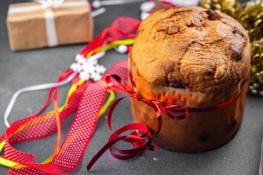 Panetone noel pastası tatili tatlı tatlı tatlı Noel 'ler, yeni yıl kutlaması, sofrada atıştırmalık yemek, fotokopi, uzay yiyecekleri arka plan kırsal manzarası.