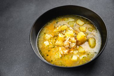 Sebze çorbası, pirinç çorbası, patates, havuç, soğan sağlıklı iştah açıcı yemek aperatifler masada fotokopi uzay yemeği arka plan kırsal üst görüş keto veya paleo diyet vejetaryen gıda