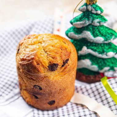Panettone Noel 'i tatlı pasta Noel tatlı tatlı tatlı tatlı tatil ve masa üzerinde yemek atıştırmalıkları fotokopi arka plan kırsal manzarası