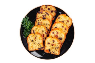 Meyveli tatlı tatlı, meyveli pasta kurutulmuş vişne, kurutulmuş kayısı, kuru erik, Noel tatlı tatlı Noel tatili yeni yıl yemeği ve Noel yemeği atıştırmalıkları masa arkası uzay yiyeceklerinin fotokopisinde.