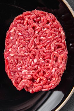 Çiğ pirzola, taze et, hamburger, yemek, abur cubur, fotokopi, arka plan, kırsal alan manzarası.