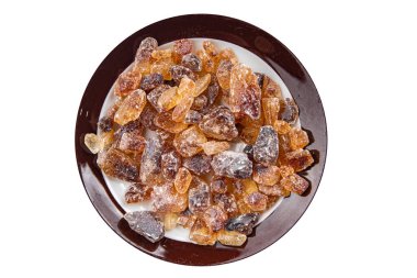 Kaya şekeri kristalleri şeker esmer şeker büyük karamelli şeker kamış şekeri sağlıklı yemek aperatifleri yemek aperatifleri masa üzerinde fotokopi alanı arka plan kırsal üst görünüm