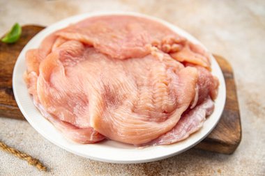 Çiğ hindi fileto taze kümes hayvanları yemek aperatifleri fotokopi uzayı arka plan kırsal manzarası 