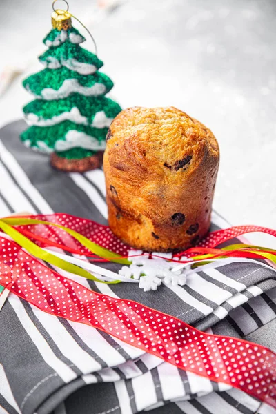 christmas panettone baking sweet pastry dried fruits chocolate sweet dessert holiday treat new year and christmas celebration meal food snack on the table copy space food background rustic