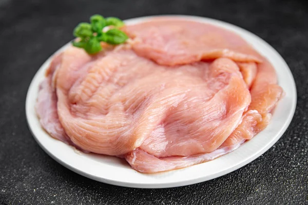raw turkey fillet slice fresh poultry meat healthy eating cooking meal food snack on the table copy space food background rustic top view keto or paleo diet