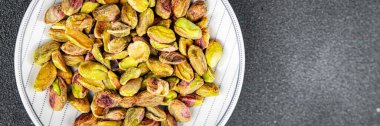 Fıstık kabuksuz soyulmuş fıstık sağlıklı yemek aperatifi yemek aperatifi masada fotokopi uzay yemeği arka plan kırsal üst görüş keto veya paleo diyet vejetaryen gıda