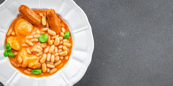 cassoulet dish  thick bean soup meat, bean, sausage delicious eating cooking appetizer meal food snack on the table copy space