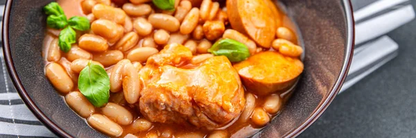 cassoulet thick bean soup meat, beans, sausages eating cooking appetizer meal food snack on the table copy space