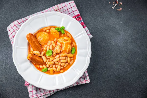 cassoulet thick bean soup meat, beans, sausages eating cooking appetizer meal food snack on the table copy space