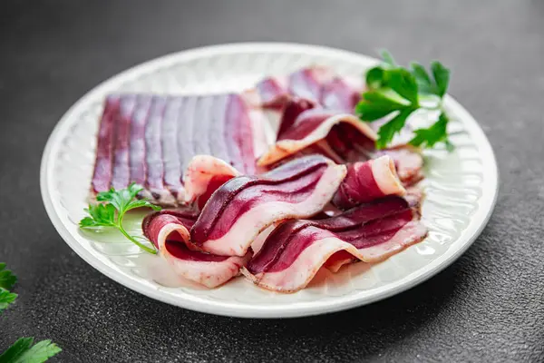 duck breast smoked dried meat magret jerky cured meat fresh eating cooking appetizer meal food snack on the table copy space food background rustic top view