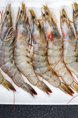 prawn raw shrimp fresh seafood eating cooking meal food snack on the table copy space food background rustic top view clipart