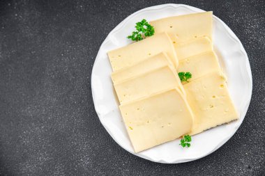 Raclette peyniri türü peynir iştah açıcı yemek atıştırmalığı fotokopi masasında yer alan yiyecek arka plan kırsal üst görünüm