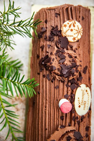 christmas log sweet roll chocolate biscuit christmas sweet dessert holiday baking treat new year and christmas celebration meal food snack on the table copy space food background rustic top view