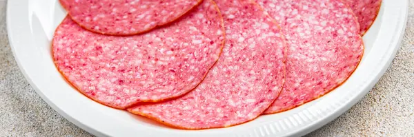 salami sausage meat ready to eat  eating cooking appetizer meal food snack on the table copy space food background rustic top view