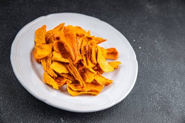 Kurutulmuş mango lezzetli meyve kurutulmuş meyve faydalı taze sağlıklı yemek aperatifi masada yemek aperatifi fotokopi uzayı arka planı kırsal üst görünüm keto ya da paleo diyet vejetaryen yemeği