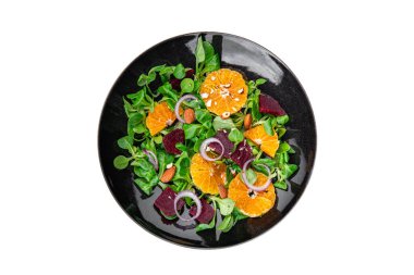 Turunçgil salatası, pancar, yeşil yaprak marul taze sağlıklı yemek atıştırmalıkları fotokopi masasında. 