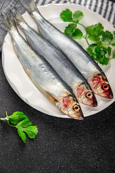 herring fish fresh raw seafood tasty eating cooking appetizer meal food snack on the table copy space food background rustic top view